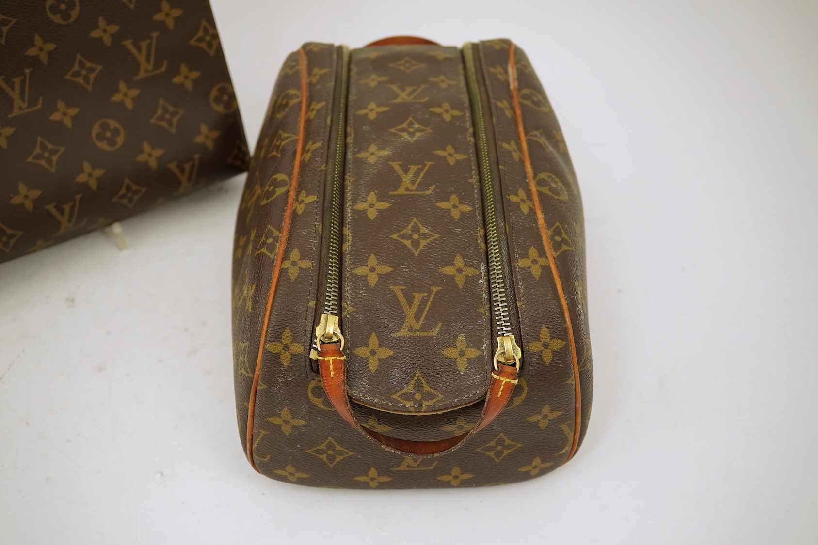 Two Louis Vuitton wash bags